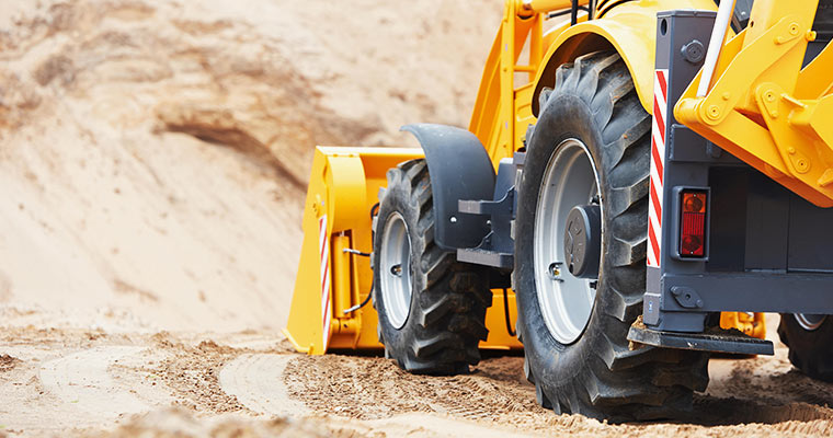 Jak zorganizować transport maszyn budowlanych?